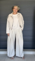 Pantalón ancho pinzas crema - vista lateral