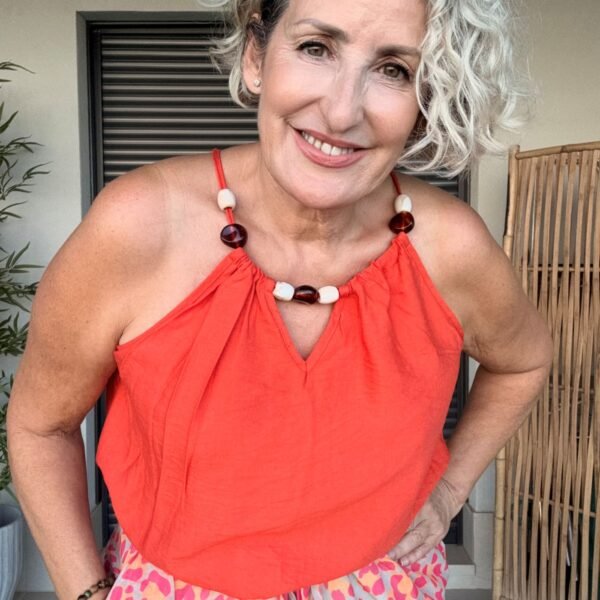 Top Naranja Instinto.